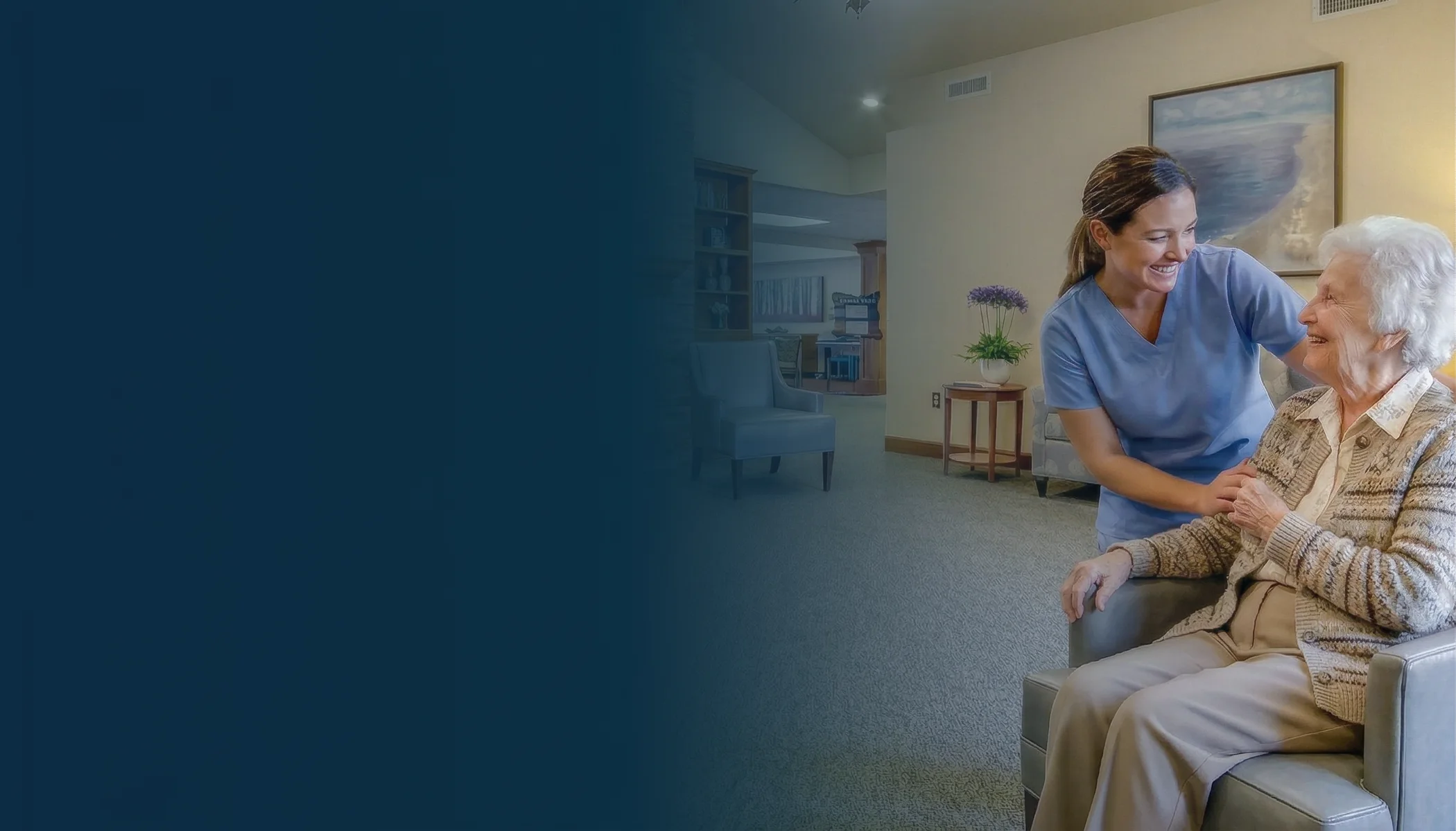 Senior resident smiling while spending time with caregiver at Grand Haven