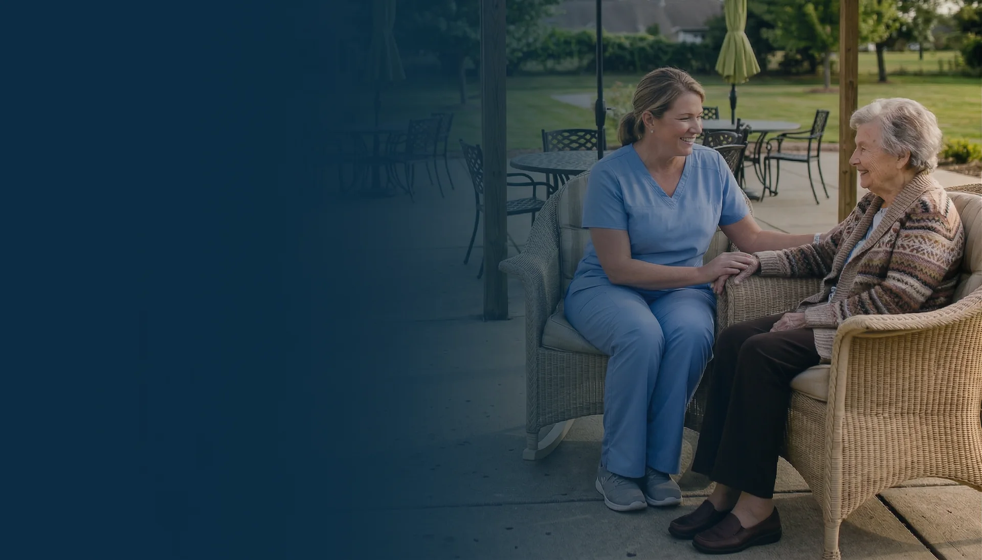 Senior resident smiling while spending time with caregiver at Grand Haven